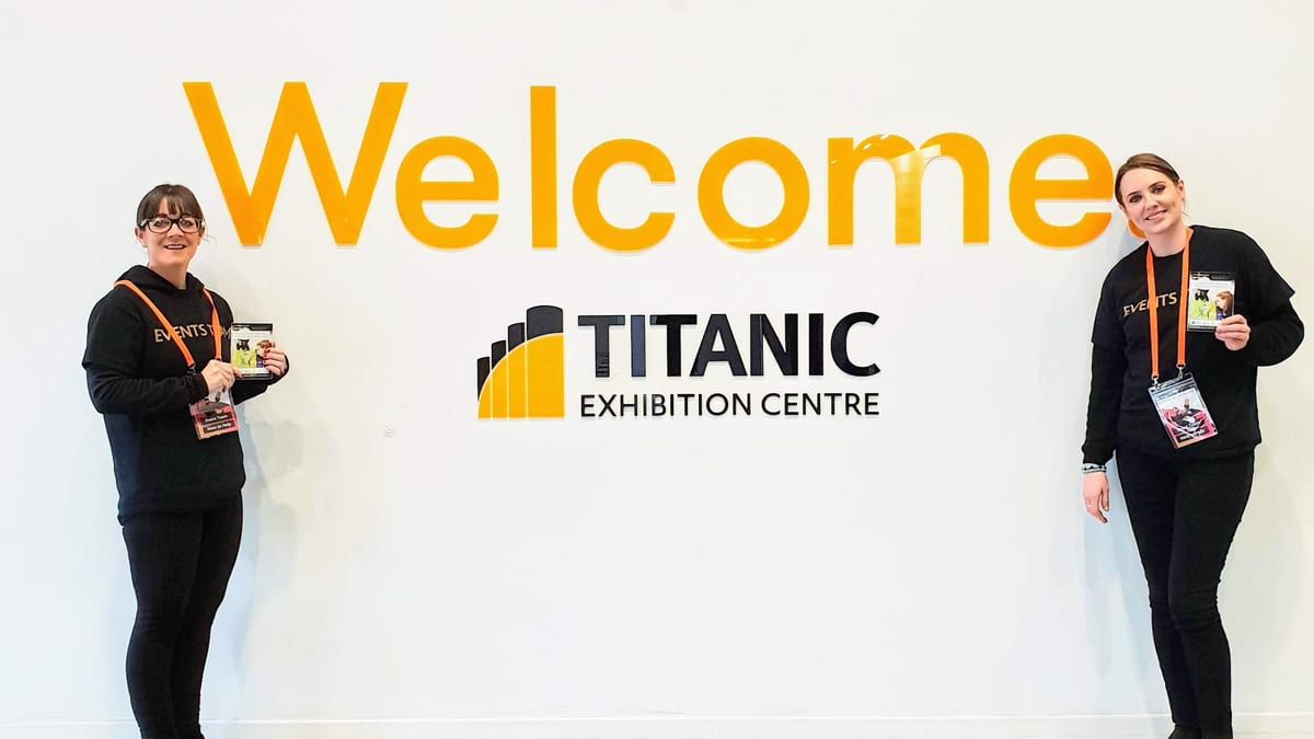 Executional event staff welcoming visitors at the Titanic Exhibition Centre, Belfast