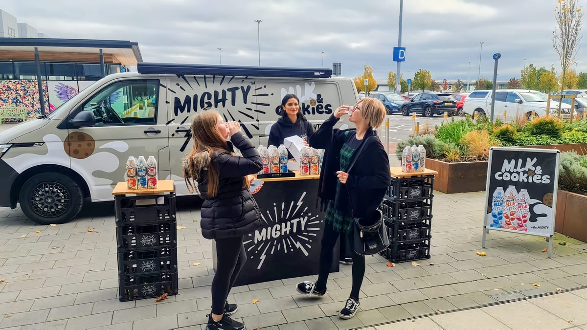 Shoppers sampling Mighty drinks at the van