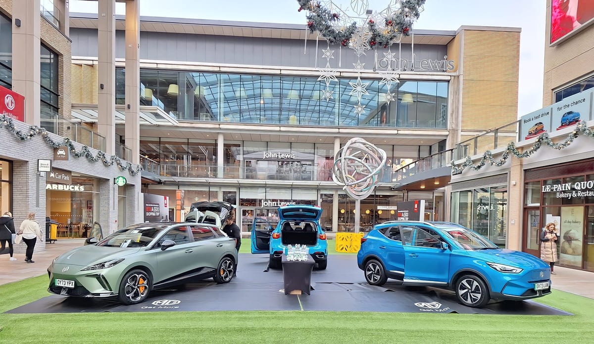 Promotional staff at the MG display inside Westgate Oxford shopping centre