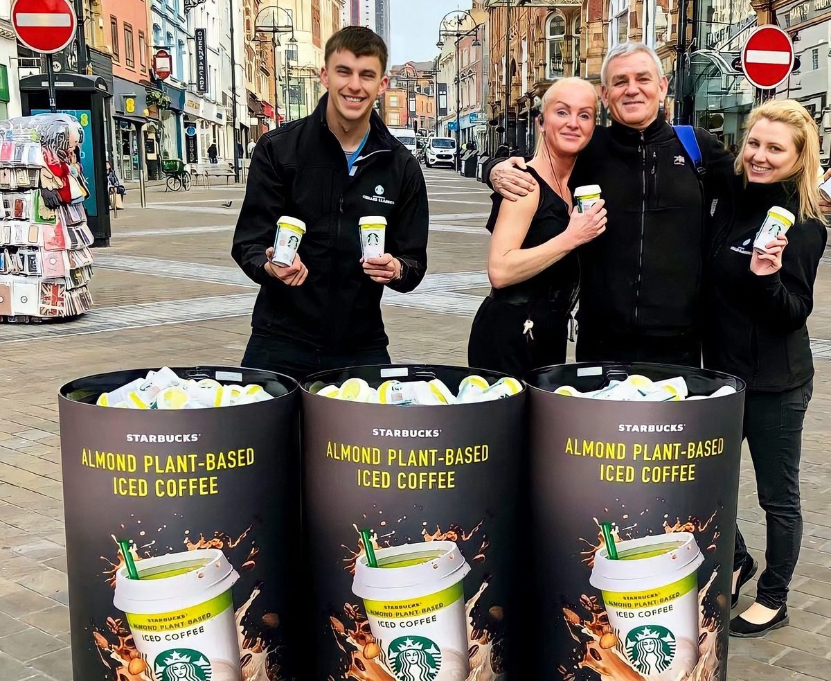 Team with a Starbucks sampling display near the Asda entrance