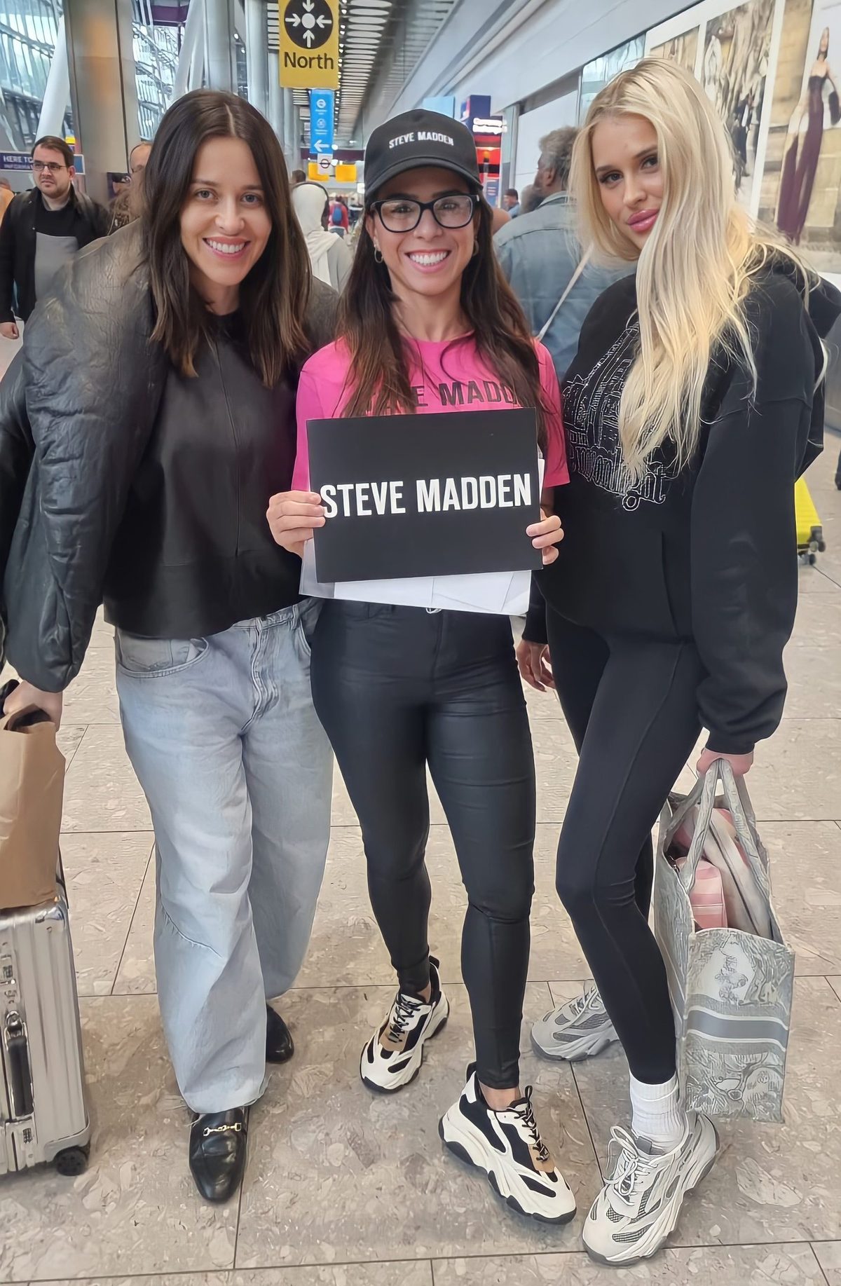 Staff greeting VIP guests for Steve Madden at an airport
