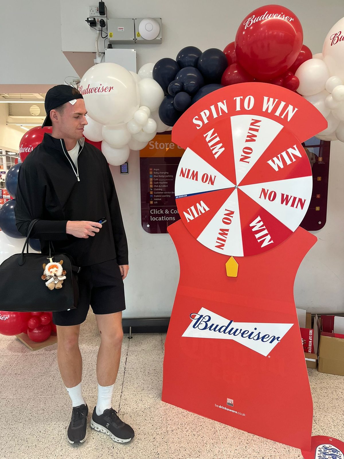 Brand ambassadors at the Budweiser pop-up inside Sainsbury's Wandsworth Road