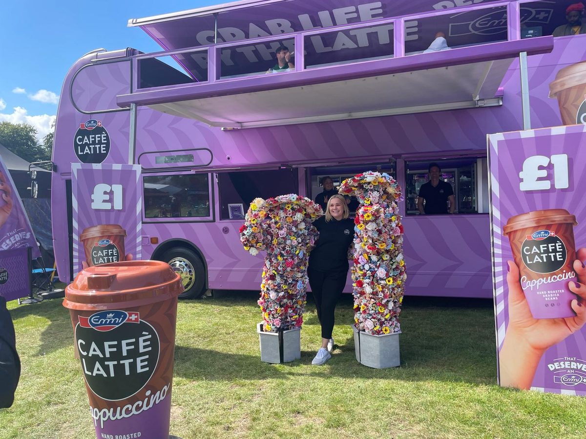 staff serving iced Emmi Caffé Latte flavours at the stand