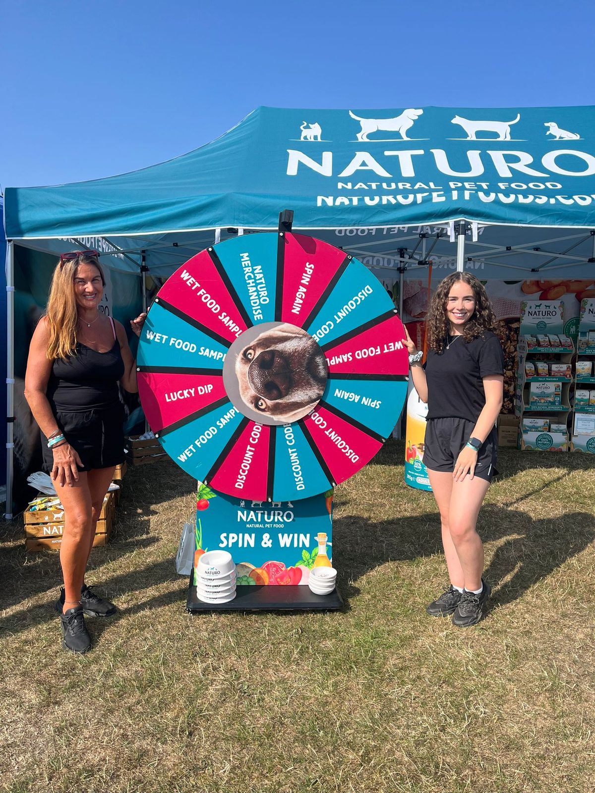 Ambassadors setting up the Naturo stand at Malvern Three Counties Showground
