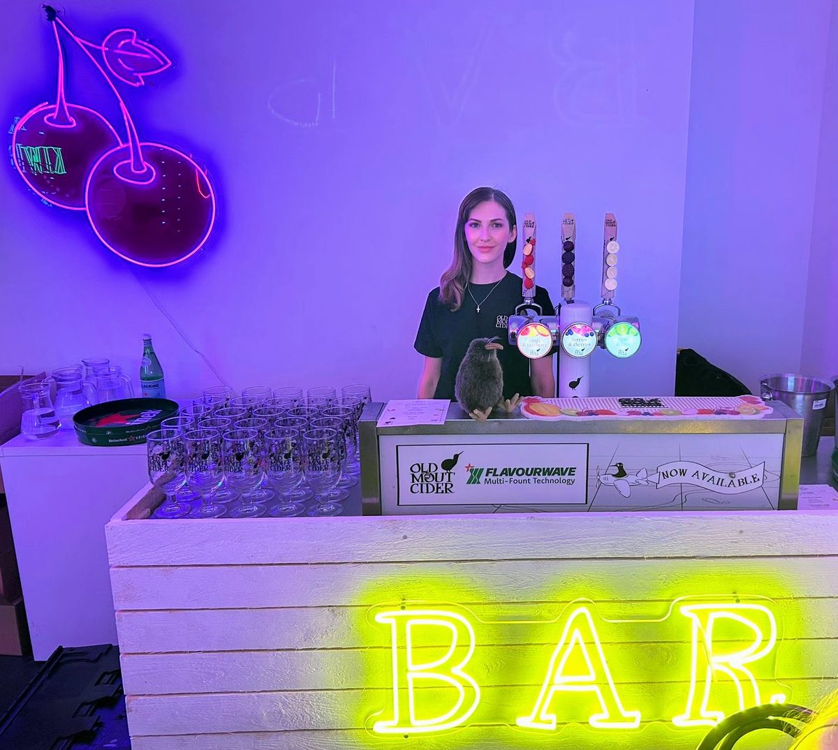 Event staff serving Old Mout Cider on draught at a London bar