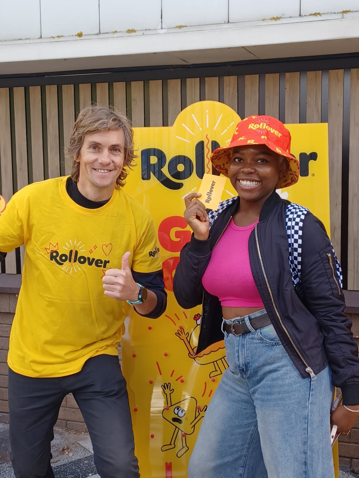 Rollover brand ambassadors engaging students at a university freshers fair