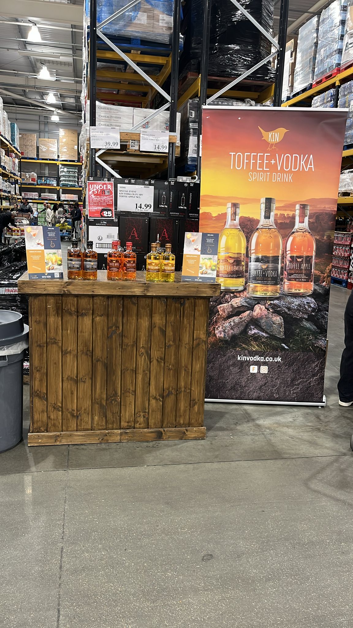 Kin Vodka sampling stand with branded display at a Costco store