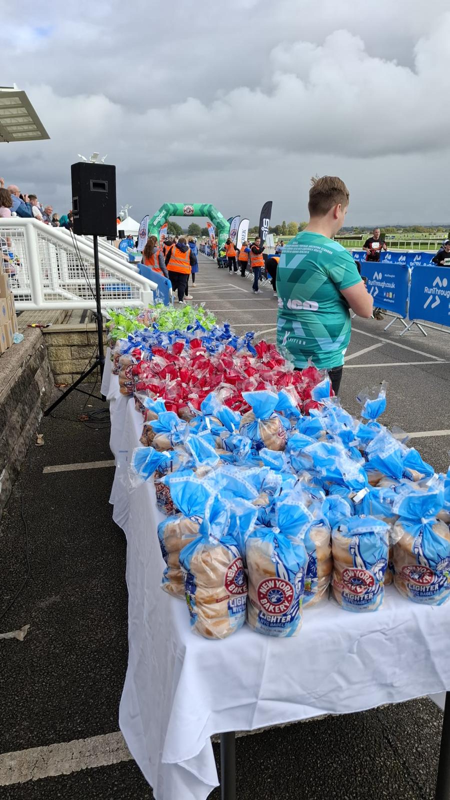 Brand ambassadors handing out New York Bakery bagels at the Run Aintree finish