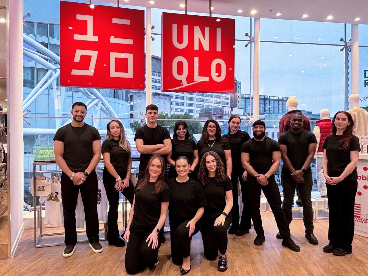 Store launch team in matching black inside the UNIQLO store in Birmingham