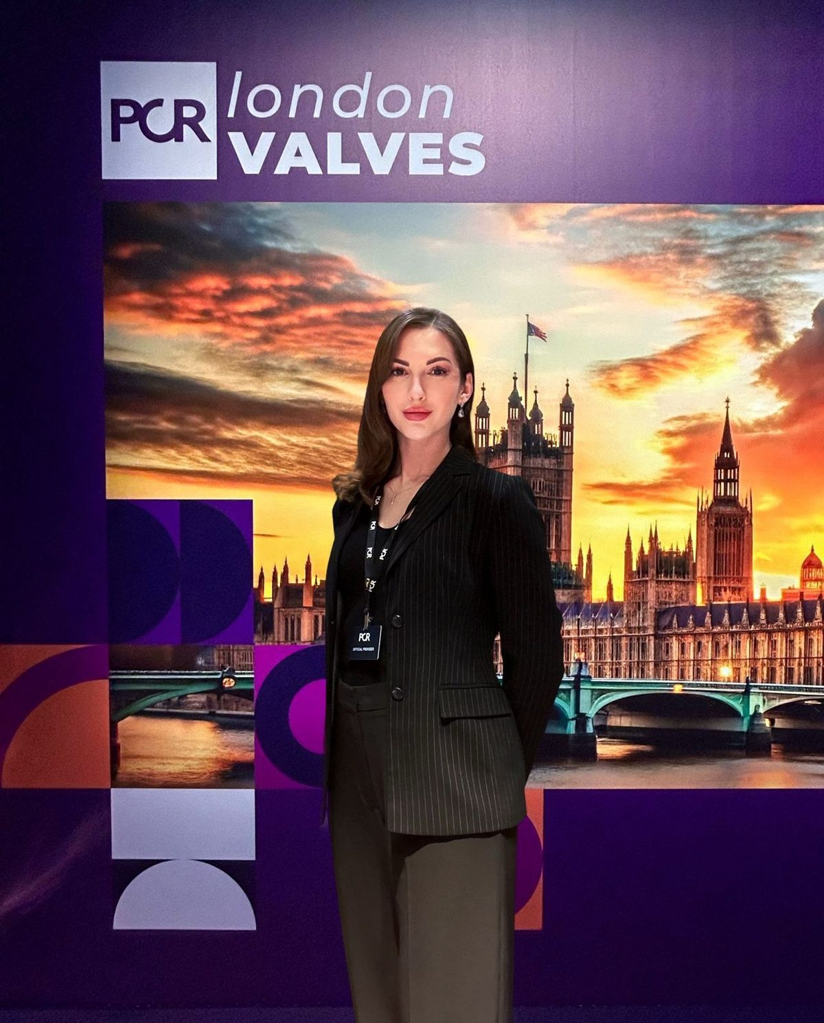 Conference host in dark tailoring at PCR London Valves