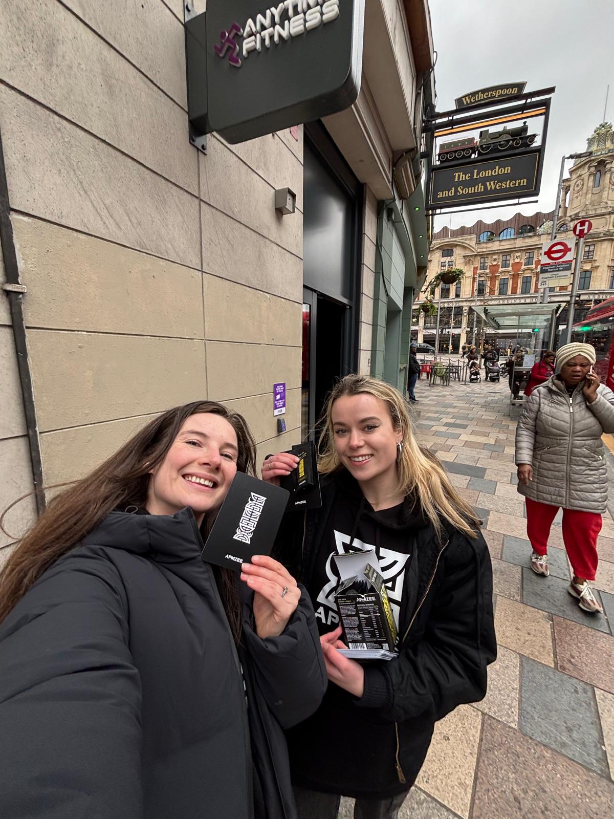 brand ambassador sampling APMZEE products to commuters in London