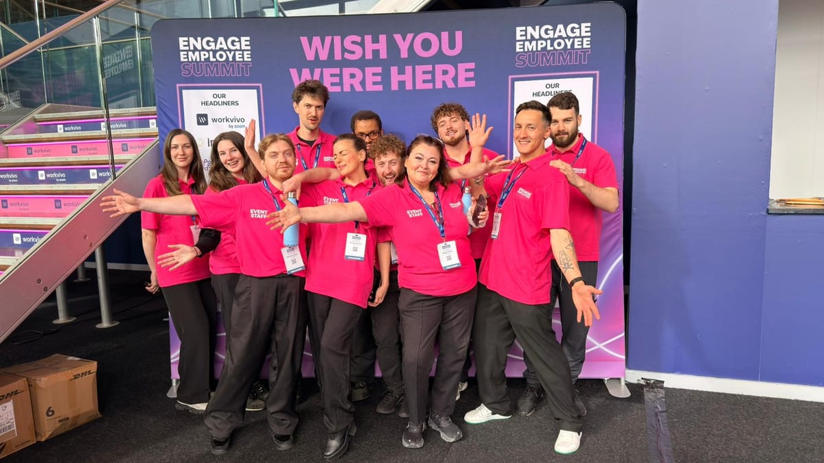 Conference staff welcoming delegates at the Engage Employee Summit in Battersea Park