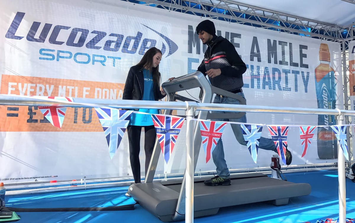 Lucozade Sport event staff on the treadmill stage at a public event in Brighton