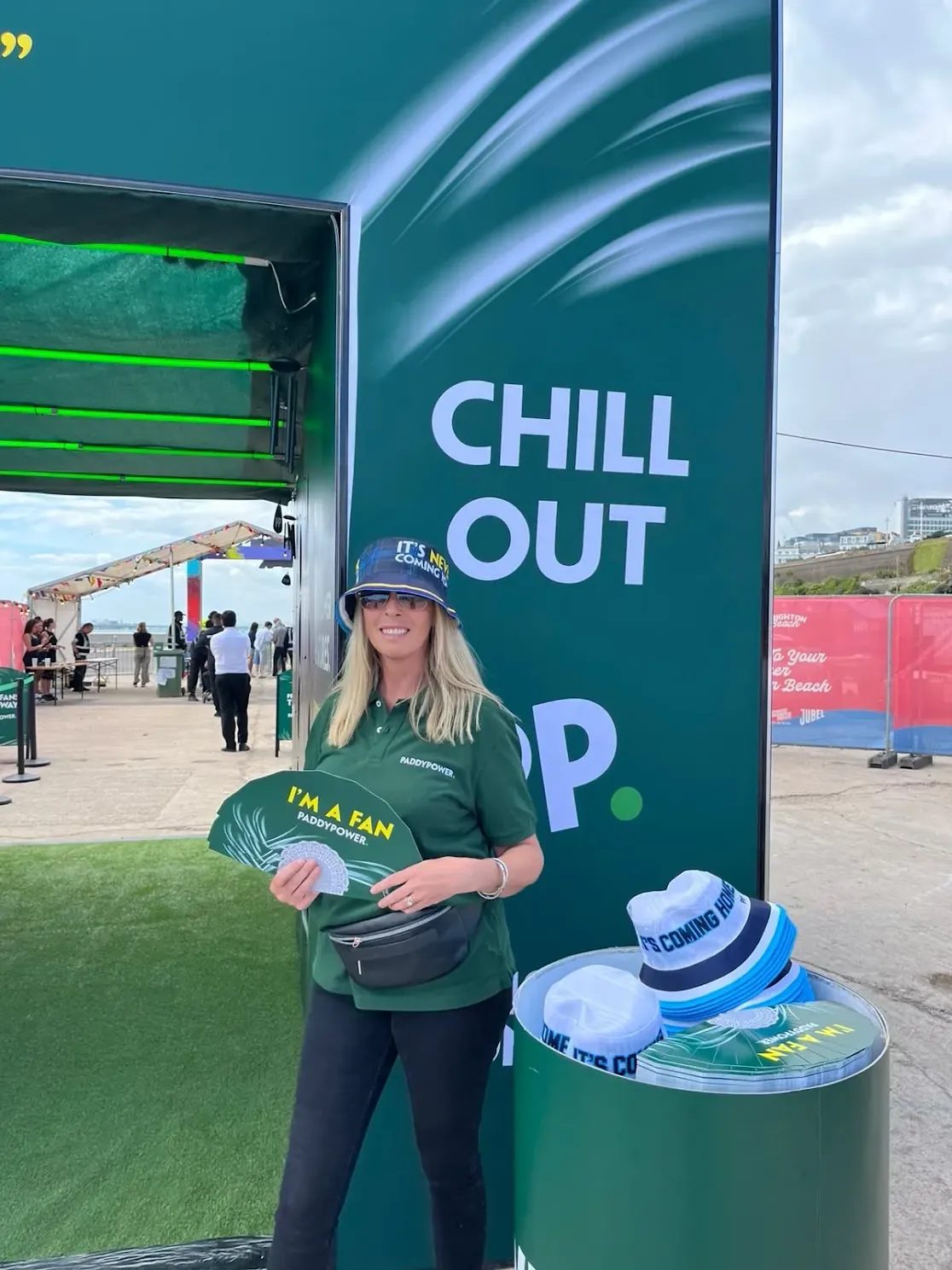 Branded fan zone tunnel on Madeira Drive with Event staff beside it