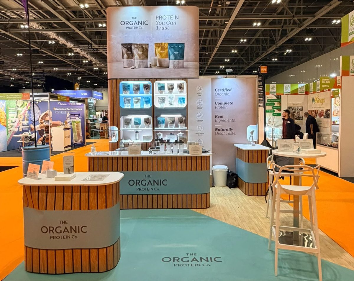 exhibition staff preparing protein shakes at a stand at ExCeL London