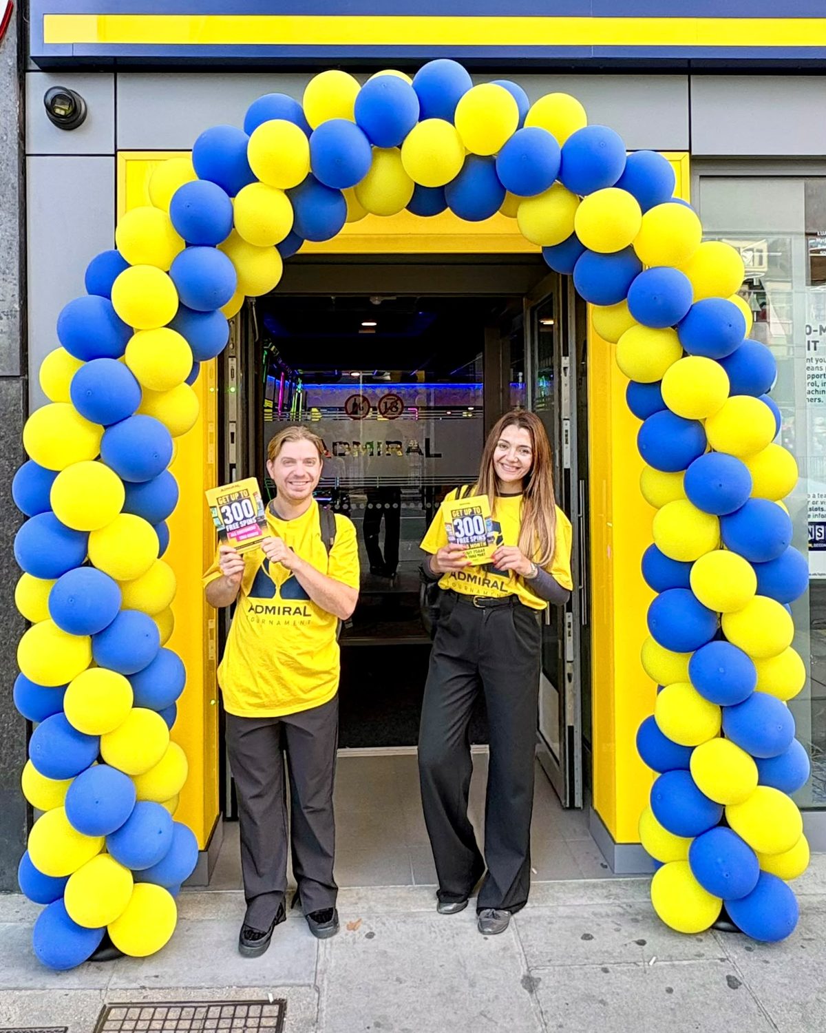 Executional team handing out leaflets at a London venue launch