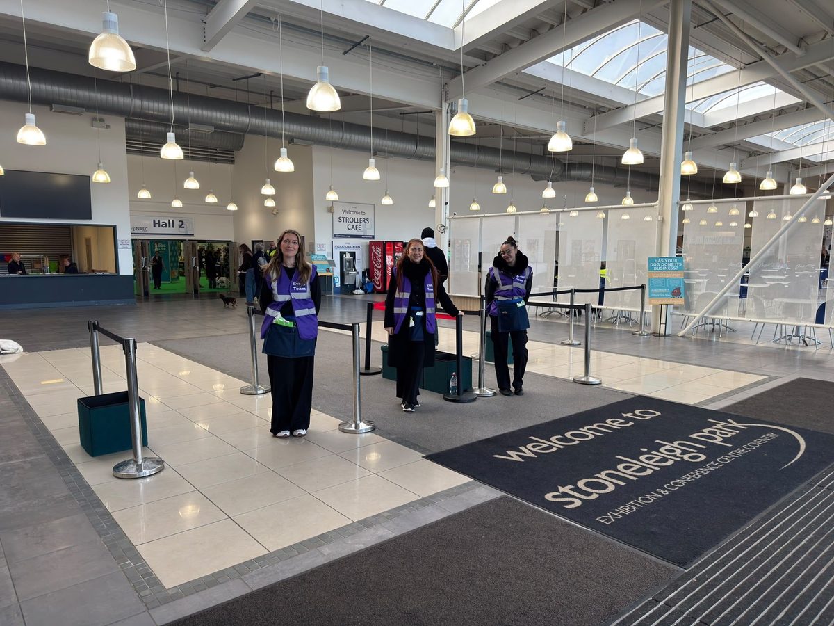 Welcome team positioned in the Stoneleigh Park foyer ready for Edition Dog Live visitors