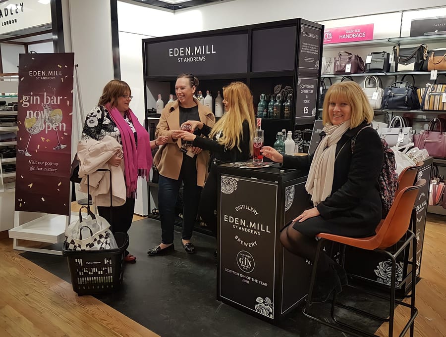 EXECUTIONAL staff running an Eden Mill gin tasting counter in store