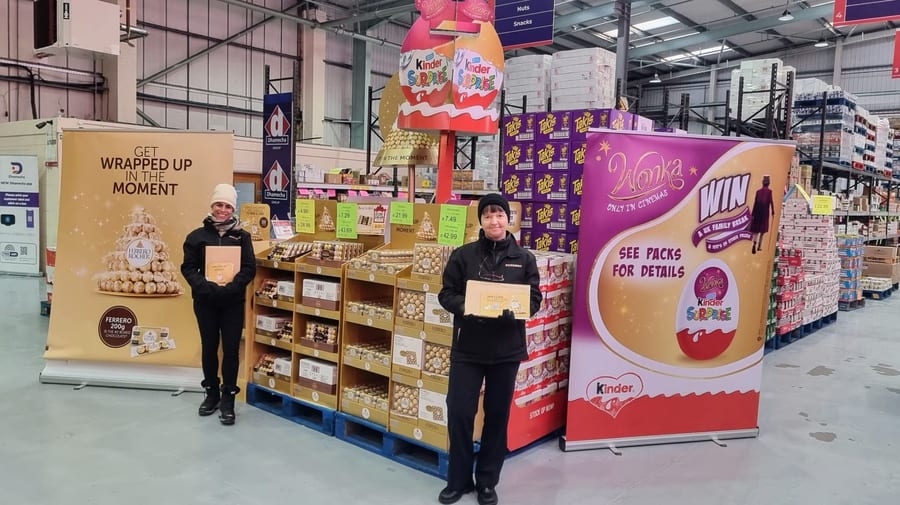 EXECUTIONAL merchandisers beside newly installed festive point of sale in store