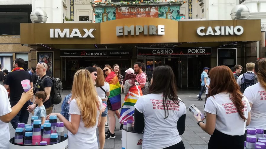 EXECUTIONAL promotional staff handing out samples outside a cinema in Leicester Square