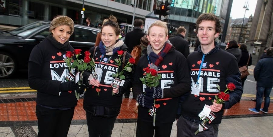 EXECUTIONAL promotional team handing out roses for a Moonpig Valentine's promotion outside a station
