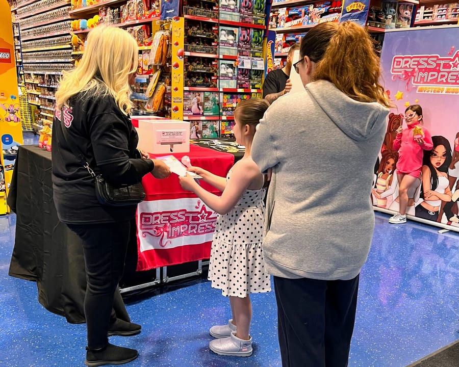 EXECUTIONAL team member on the shop floor of a toy store
