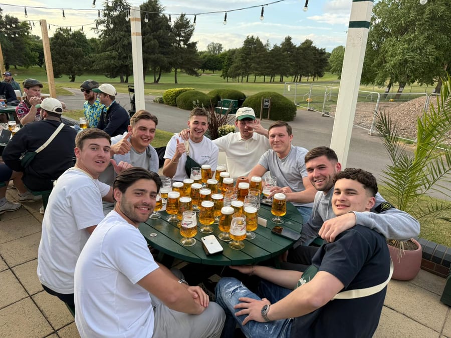 Guests at a table on a hotel terrace