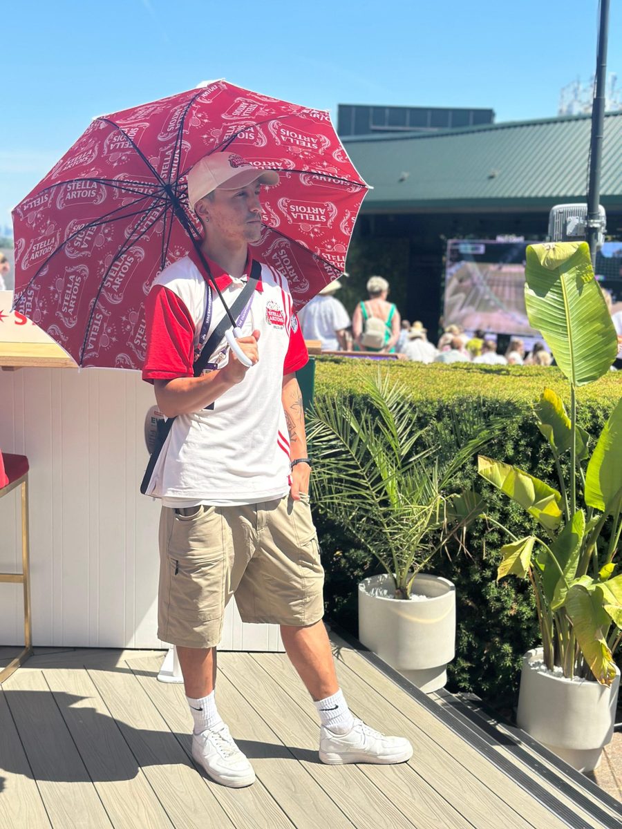 EXECUTIONAL host serving guests at the Stella Artois space during Wimbledon