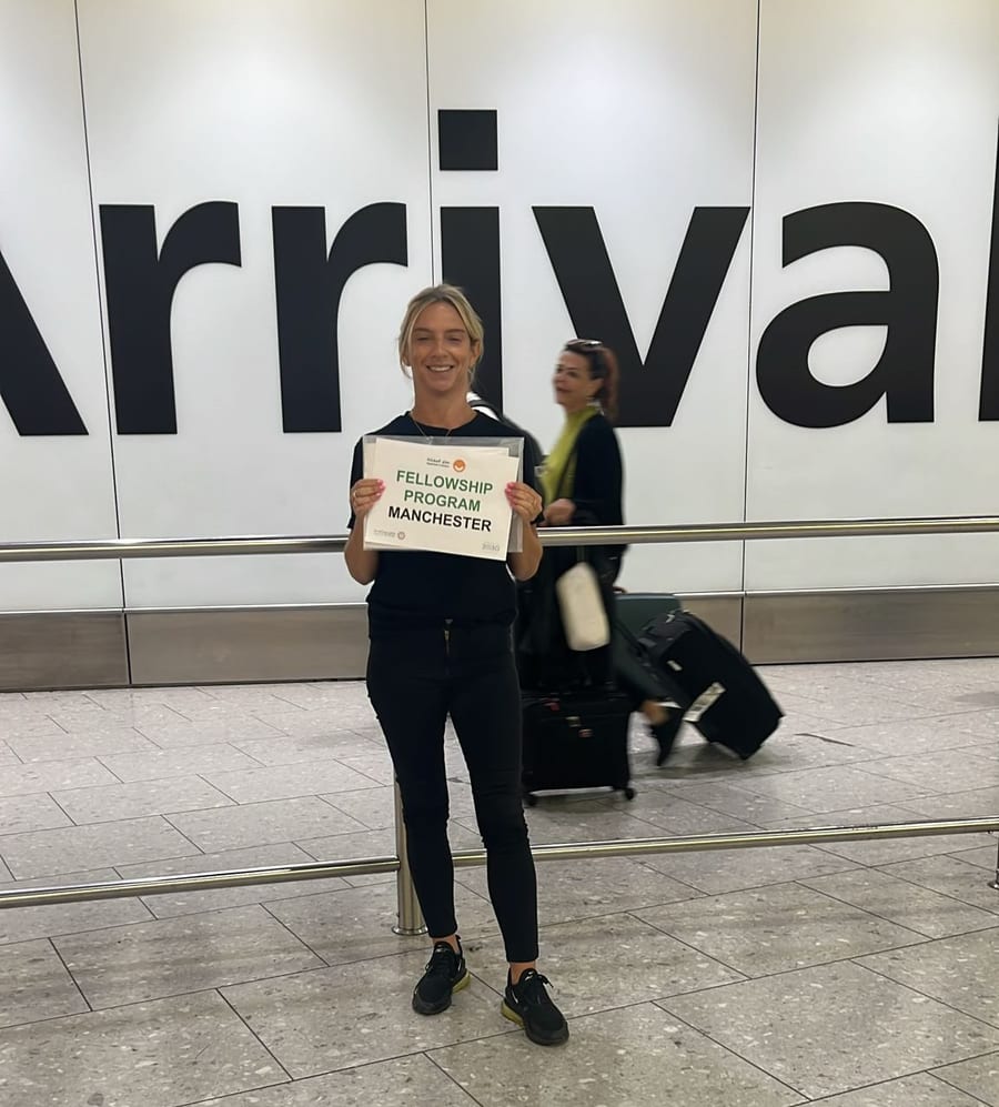EXECUTIONAL arrivals host with a name board at London Heathrow for Trip Concierge