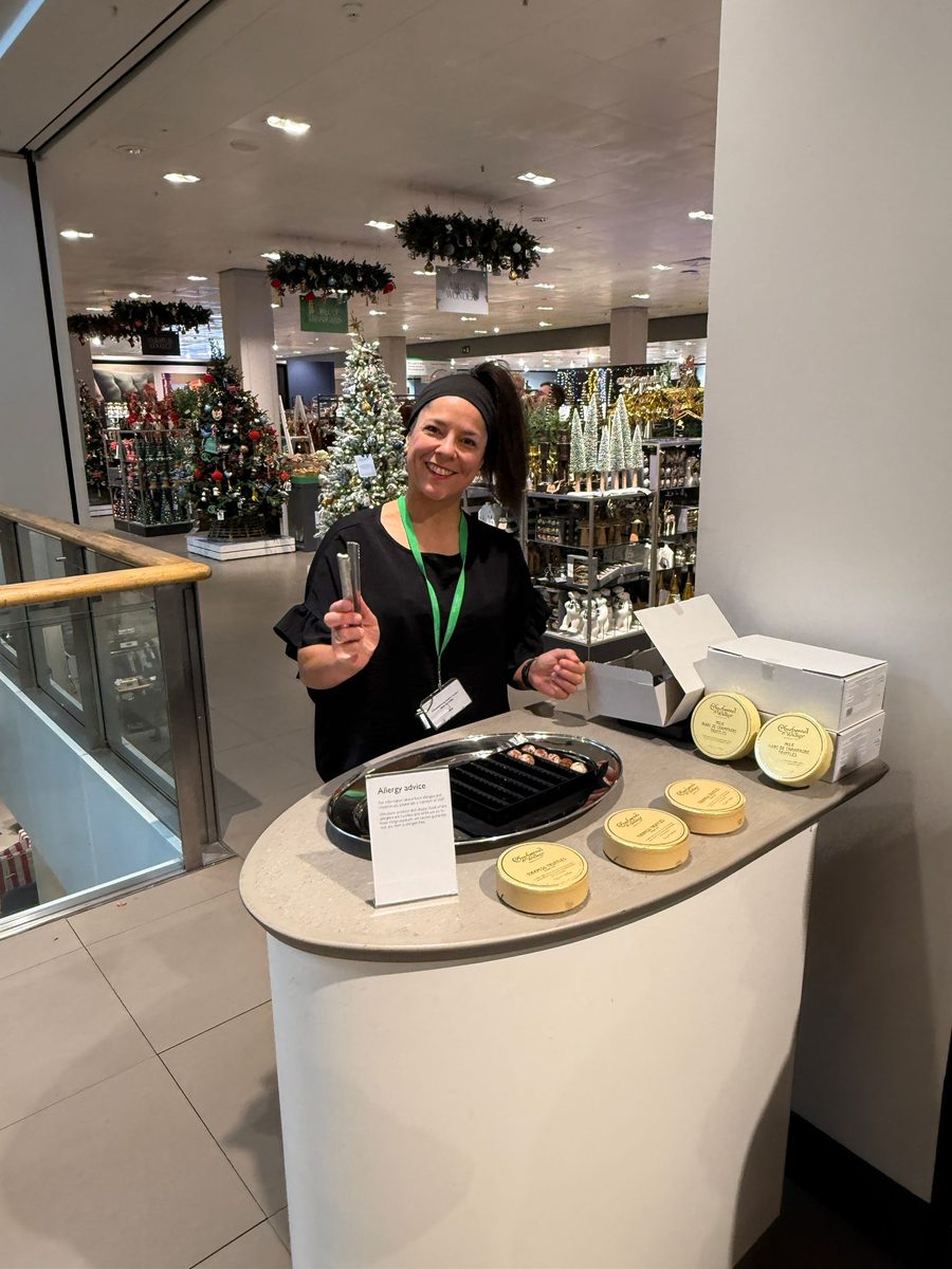EXECUTIONAL promotional model offering Charbonnel et Walker tastings in a John Lewis store