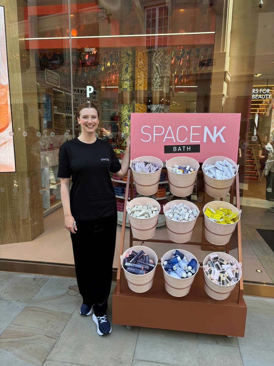 EXECUTIONAL team member beside a newly fitted Space NK display at the Bath store