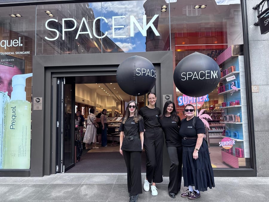 EXECUTIONAL brand team at a Space NK store entrance