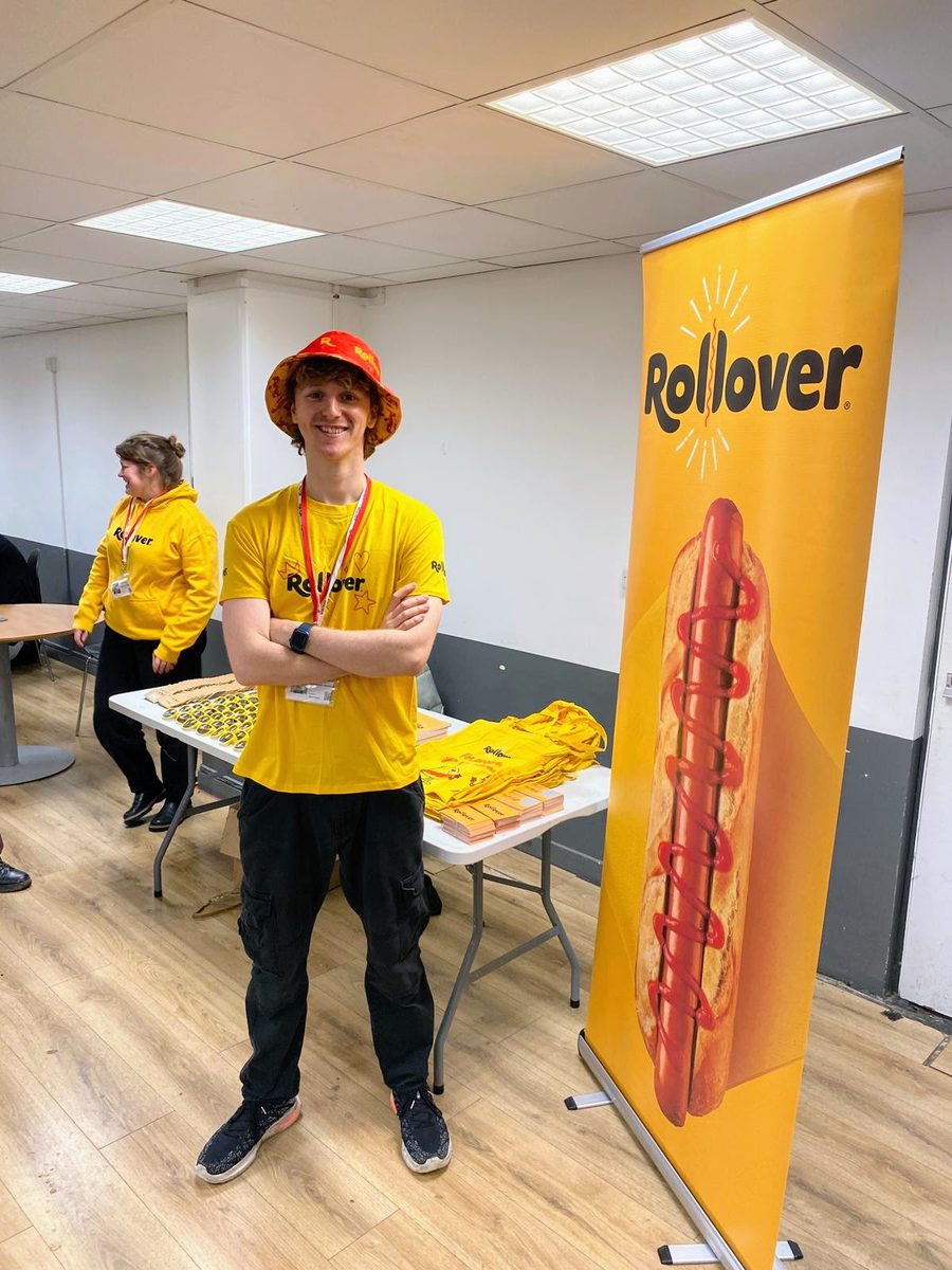 EXECUTIONAL student brand ambassador on the Rollover stand at a freshers fair